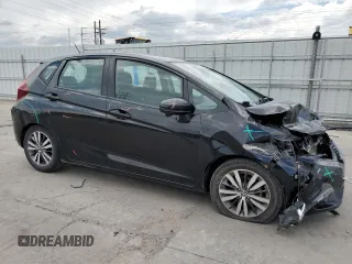 2015 Honda Fit EX-L z VIN 3HGGK5H80FM704920, wystawiony jako Copart lot #59834245 z przebiegiem 86 415 mil mil oraz Szkoda całkowita • Salvage title. Historia ofert i sprzedaży dostępna na DreamBid. Obrazek 4.