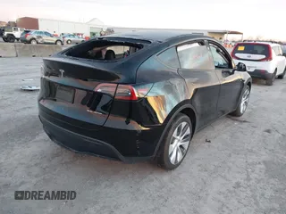 2023 Tesla Model Y Long Range z VIN 7SAYGDEE2PA166042, wystawiony jako IAAI lot #41348960 z przebiegiem Nie podano mil oraz . Historia ofert i sprzedaży dostępna na DreamBid. Obrazek 4.