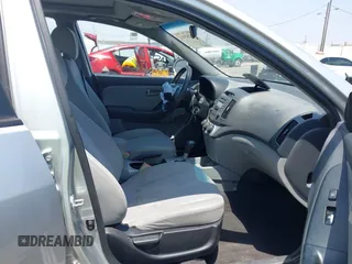 2009 Hyundai Elantra GLS z VIN KMHDU46D89U716718, wystawiony jako IAAI lot #42282841 z przebiegiem 130 843 mil mil oraz . Historia ofert i sprzedaży dostępna na DreamBid. Obrazek 5.