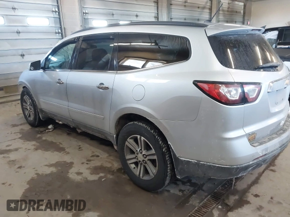 2015 Chevrolet Traverse LT with VIN 1GNKVHKD3FJ126405, listed as a IAAI auction lot 41597600 with 188,558 mi miles and . Bid and sale history available at DreamBid. Image 3.