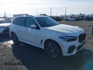2021 BMW X5 xDrive40i z VIN 5UXCR6C05M9F27732, wystawiony jako IAAI lot #41382662 z przebiegiem 38 348 mil mil oraz . Historia ofert i sprzedaży dostępna na DreamBid. Obrazek 1.