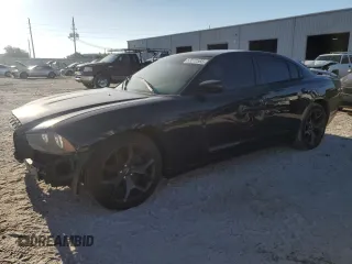 2014 Dodge Charger SXT z VIN 2C3CDXHG1EH123860, wystawiony jako Copart lot #53272565 z przebiegiem 188 897 mil mil oraz Szkoda całkowita • Salvage title. Historia ofert i sprzedaży dostępna na DreamBid. Obrazek 1.