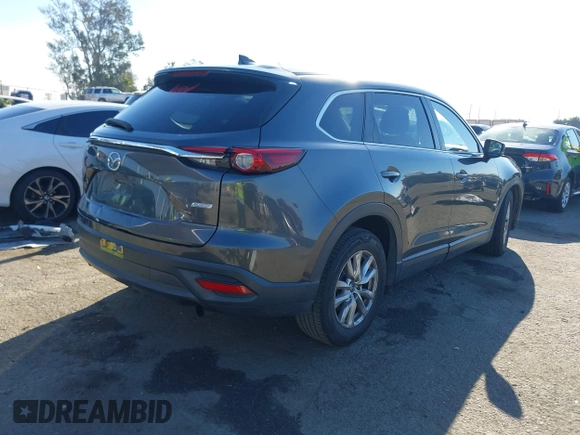 2017 Mazda CX-9 Sport with VIN JM3TCABY4H0128483, listed as a IAAI auction lot 41299667 with 142,343 mi miles and . Bid and sale history available at DreamBid. Image 4.