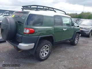 2014 Toyota FJ Cruiser with VIN JTEBU4BF1EK203587, listed as a IAAI auction lot 41978010 with 62,438 mi miles. Bid and sale history available at carsss.com. Image 4.