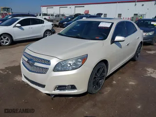 2013 Chevrolet Malibu LTZ with VIN 1G11J5SX2DF337404, listed as a IAAI auction lot 41732337 with 112,276 mi miles. Bid and sale history available at carsss.com. Image 2.