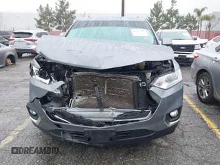 2021 Chevrolet Traverse LT z VIN 1GNERHKWXMJ249859, wystawiony jako IAAI lot #41557487 z przebiegiem 49 849 mil mil oraz . Historia ofert i sprzedaży dostępna na DreamBid. Obrazek 6.