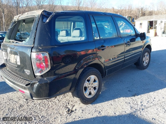 2007 Honda Pilot LX with VIN 5FNYF18177B017068, listed as a IAAI auction lot 41844268 with 164,145 mi miles. Bid and sale history available at carsss.com. Image 4.