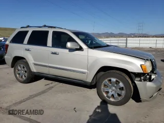 2010 Jeep Grand Cherokee Limited with VIN 1J4RR5GT3AC135686, listed as a Copart auction lot 52961465 with 136,034 mi miles and Salvage title. Bid and sale history available at DreamBid. Image 4.