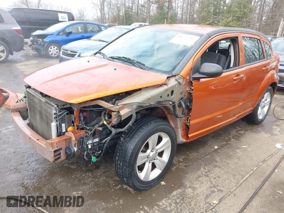 2011 Dodge Caliber Mainstreet z VIN 1B3CB3HA6BD262107, wystawiony jako IAAI lot #41663951 z przebiegiem 121 324 mil mil oraz . Historia ofert i sprzedaży dostępna na DreamBid. Obrazek 2.