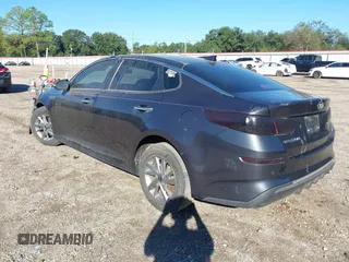 2019 Kia Optima LX with VIN 5XXGT4L3XKG292437, listed as a IAAI auction lot 40682048 with 151,012 mi miles. Bid and sale history available at carsss.com. Image 3.