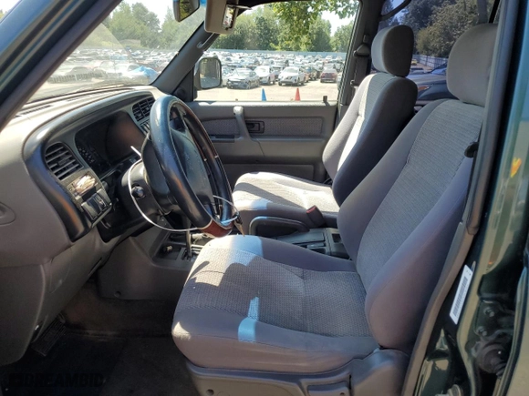 1999 Isuzu Trooper S with VIN JACDJ58X6X7913469, listed as a Copart auction lot 74690934 with 202,379 mi miles and Salvage Title. Bid and sale history available at carsss.com. Image 7.