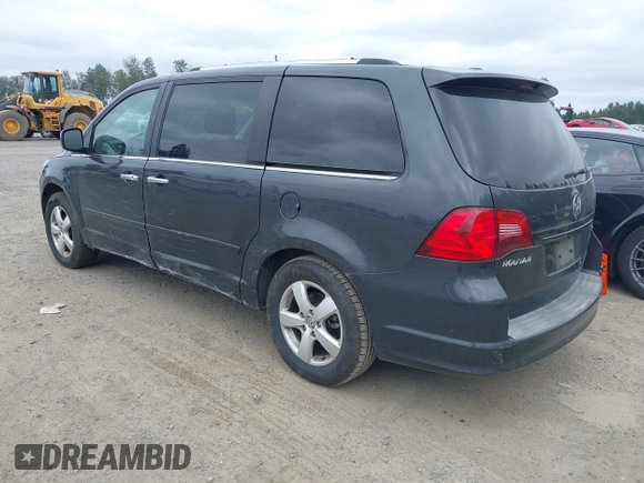 2011 Volkswagen Routan z VIN 2V4RW6DG5BR738696, wystawiony jako IAAI lot #42513978 z przebiegiem 180 933 mil mil oraz . Historia ofert i sprzedaży dostępna na DreamBid. Obrazek 3.