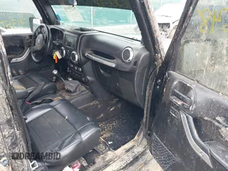 2012 Jeep Wrangler Unlimited Call of Duty MW3 z VIN 1C4BJWFG0CL202238, wystawiony jako IAAI lot #41956648 z przebiegiem 92 572 mil mil oraz . Historia ofert i sprzedaży dostępna na DreamBid. Obrazek 5.