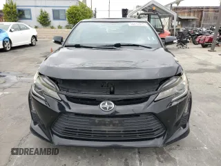 2015 Scion tC z VIN JTKJF5C75F3093123, wystawiony jako Copart lot #58414325 z przebiegiem 107 051 mil mil oraz Szkoda całkowita • Salvage title. Historia ofert i sprzedaży dostępna na DreamBid. Obrazek 5.