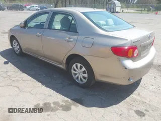 2010 Toyota Corolla with VIN 1NXBU4EE9AZ295128, listed as a IAAI auction lot 42118631 with 197,839 mi miles. Bid and sale history available at carsss.com. Image 3.