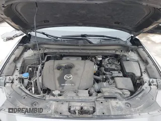 2021 Mazda CX-5 Touring with VIN JM3KFBCM0M0342210, listed as a IAAI auction lot 41236013 with 96,012 mi miles. Bid and sale history available at carsss.com. Image 10.