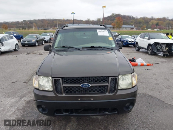 2005 Ford Explorer Sport Trac XLS z VIN 1FMZU77K05UB13891, wystawiony jako IAAI lot #40859877 z przebiegiem 157 308 mil mil oraz . Historia ofert i sprzedaży dostępna na DreamBid. Obrazek 12.