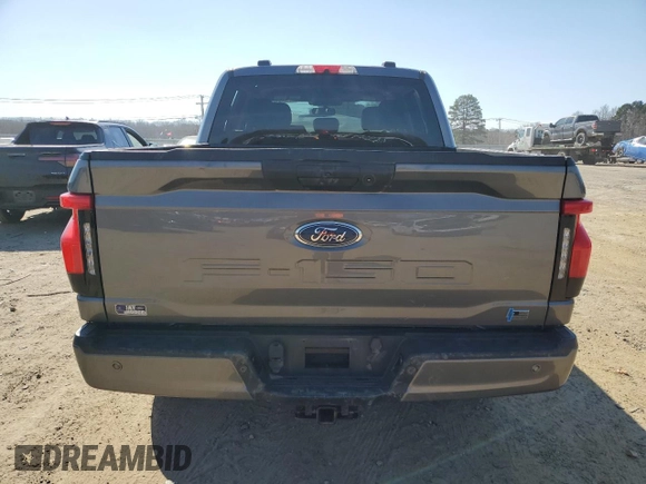 2022 Ford F-150 Lightning Pro с VIN 1FTVW1EL1NWG02388, выставлен на аукционе Copart как лот 46108645 с пробегом 20 284 миль миль и Списание • Salvage title. История ставок и продаж доступна на DreamBid. Изображение 6.