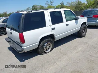 1996 Chevrolet Tahoe z VIN 1GNEK13R9TJ357134, wystawiony jako IAAI lot #42218520 z przebiegiem 213 135 mil mil oraz . Historia ofert i sprzedaży dostępna na DreamBid. Obrazek 4.