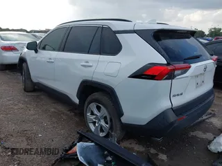 2020 Toyota RAV4 XLE with VIN JTMW1RFV0LD521893, listed as a IAAI auction lot 42701228 with 34,647 mi miles and . Bid and sale history available at DreamBid. Image 3.