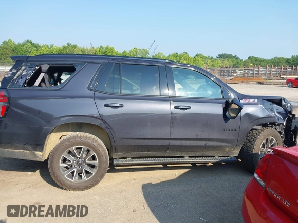 2024 Chevrolet Tahoe Z71 z VIN 1GNSKPKD8RR177147, wystawiony jako IAAI lot #42383508 z przebiegiem 28 772 mil mil oraz . Historia ofert i sprzedaży dostępna na DreamBid. Obrazek 13.