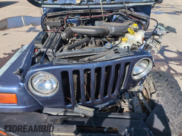 1997 Jeep Wrangler SE z VIN 1J4FY29P1VP441353, wystawiony jako Copart lot #51691545 z przebiegiem Nie podano mil oraz Szkoda całkowita • Salvage title. Historia ofert i sprzedaży dostępna na DreamBid. Obrazek 11.
