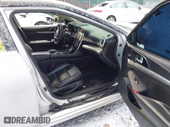 2017 Nissan Maxima Platinum with VIN 1N4AA6AP1HC411729, listed as a IAAI auction lot 41002595 with 98,934 mi miles and . Bid and sale history available at DreamBid. Image 5.