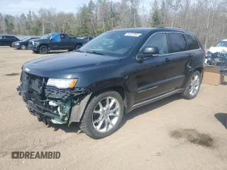 2015 Jeep Grand Cherokee Summit with VIN 1C4RJFJM3FC694733, listed as a Copart auction lot 54257905 with 123,981 mi miles and Clean title. Bid and sale history available at DreamBid. Image 1.
