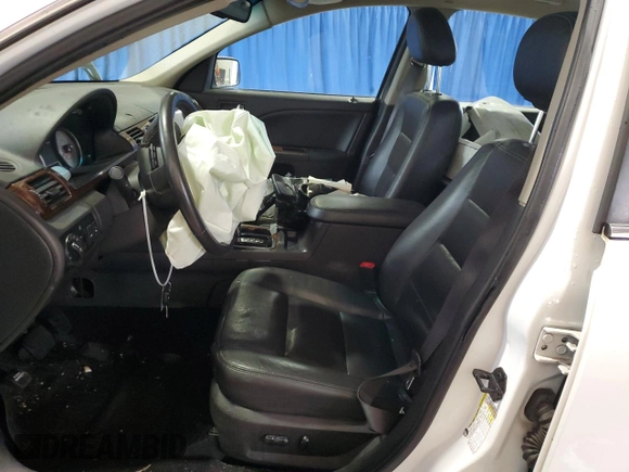2008 Ford Taurus Limited with VIN 1FAHP25W68G137797, listed as a Copart auction lot 51628665 with 141,125 mi miles and Salvage Title. Bid and sale history available at DreamBid. Image 7.