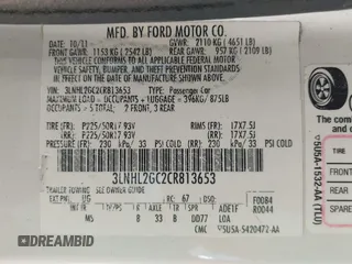 2012 Lincoln MKZ with VIN 3LNHL2GC2CR813653, listed as a IAAI auction lot 41751793 with 216,961 mi miles and . Bid and sale history available at DreamBid. Image 9.