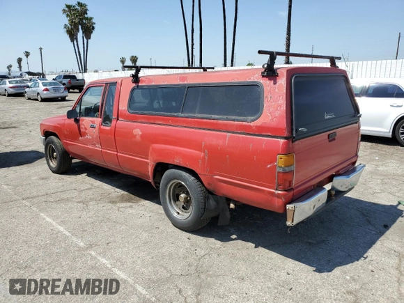 1987 Toyota Pickup с VIN JT4RN70D2H0048566, выставлен на аукционе Copart как лот 52362085 с пробегом 252 452 миль миль и Чистый • Clean title. История ставок и продаж доступна на DreamBid. Изображение 2.