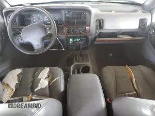 1998 Jeep Grand Cherokee Limited with VIN 1J4GZ78Y0WC294461, listed as a Copart auction lot 69477664 with 209,295 mi miles and Clean Title. Bid and sale history available at carsss.com. Image 8.