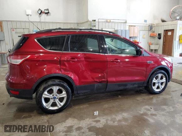 2013 Ford Escape SE with VIN 1FMCU9G90DUB00524, listed as a Copart auction lot 60226505 with 125,751 mi miles and Salvage title. Bid and sale history available at DreamBid. Image 3.