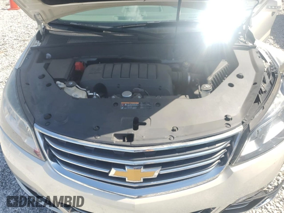 2014 Chevrolet Traverse LTZ z VIN 1GNKRJKD7EJ175097, wystawiony jako Copart lot #56717045 z przebiegiem 113 041 mil mil oraz Szkoda całkowita • Salvage title. Historia ofert i sprzedaży dostępna na DreamBid. Obrazek 12.