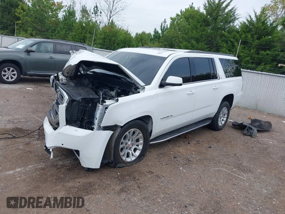 2019 GMC Yukon XL SLT with VIN 1GKS2GKC2KR369285, listed as a IAAI auction lot 40279008 with Not Provided miles and . Bid and sale history available at DreamBid. Image 17.
