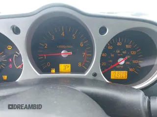 2005 Nissan 350Z Touring with VIN JN1AZ34E85M652465, listed as a IAAI auction lot 41418161 with 153,099 mi miles. Bid and sale history available at carsss.com. Image 7.