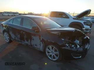 2011 Volvo S60 with VIN YV1902FH5B2014901, listed as a IAAI auction lot 41265979 with 133,616 mi miles. Bid and sale history available at carsss.com. Image 1.