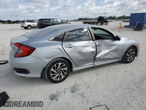 2016 Honda Civic EX with VIN 19XFC2F74GE059765, listed as a Copart auction lot 45555735 with 48,643 mi miles and Salvage Title. Bid and sale history available at DreamBid. Image 3.