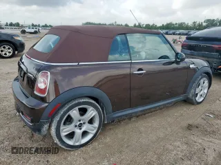 2011 MINI Convertible S with VIN WMWZP3C58BTX83725, listed as a Copart auction lot 60921875 with 45,400 mi miles and Salvage title. Bid and sale history available at DreamBid. Image 3.