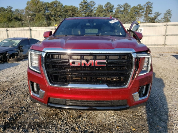 2021 GMC Yukon SLE with VIN 1GKS1AKD6MR200592, listed as a Copart auction lot 74764814 with 61,904 mi miles and Salvage Title. Bid and sale history available at carsss.com. Image 5.
