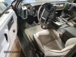 1987 Pontiac Fiero z VIN 1G2PF11R6HP237261, wystawiony jako Copart lot #85061534 z przebiegiem Nie podano mil oraz Czysty tytuł • Clean title. Historia ofert i sprzedaży dostępna na DreamBid. Obrazek 8.