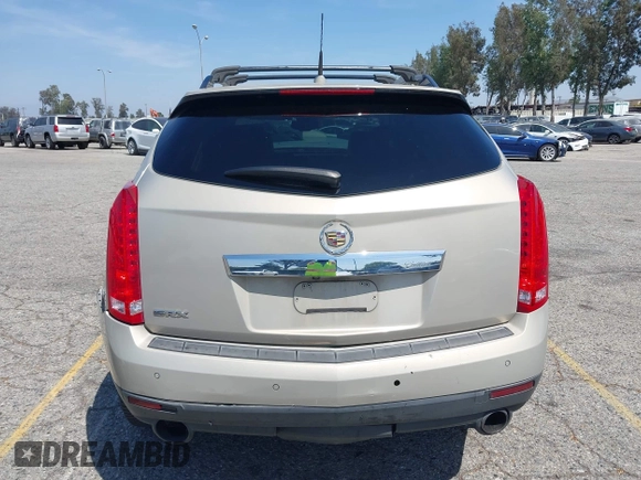 2011 Cadillac SRX Premium Collection z VIN 3GYFNCEY3BS506360, wystawiony jako IAAI lot #42096225 z przebiegiem 173 514 mil mil oraz . Historia ofert i sprzedaży dostępna na DreamBid. Obrazek 16.
