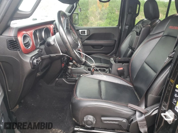 2021 Jeep Wrangler Unlimited Rubicon with VIN 1C4HJXFNXMW612186, listed as a Copart auction lot 56786665 with 52,379 mi miles and Salvage title. Bid and sale history available at DreamBid. Image 7.