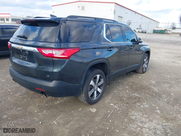 2021 Chevrolet Traverse LT Leather with VIN 1GNERHKW7MJ212137, listed as a IAAI auction lot 41420829 with 100,371 mi miles. Bid and sale history available at carsss.com. Image 4.