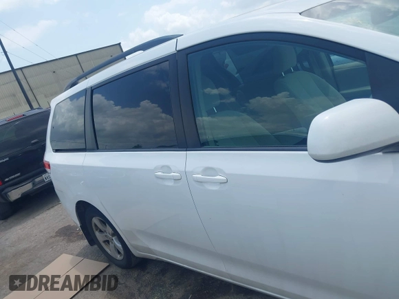 2014 Toyota Sienna LE AAS with VIN 5TDKK3DC0ES525654, listed as a IAAI auction lot 42153582 with 71,258 mi miles and . Bid and sale history available at carsss.com. Image 13.