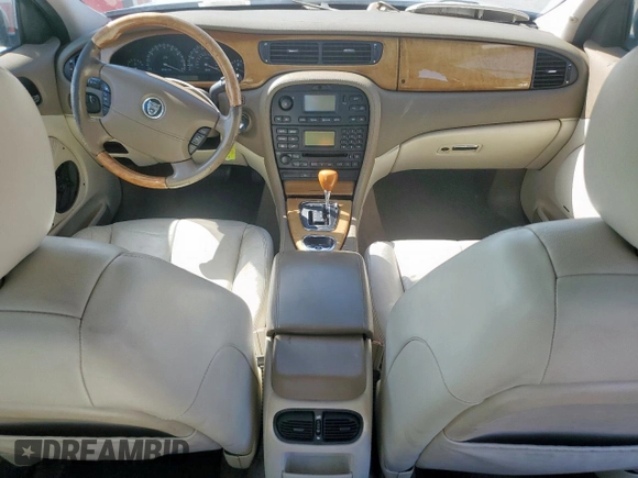 2003 Jaguar S-Type with VIN SAJEA01T43FM62477, listed as a Copart auction lot 52693085 with 109,761 mi miles and Salvage Title. Bid and sale history available at DreamBid. Image 8.