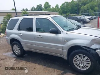 2005 Mercury Mariner Luxury z VIN 4M2CU57135DJ23718, wystawiony jako IAAI lot #42441869 z przebiegiem 179 378 mil mil oraz . Historia ofert i sprzedaży dostępna na DreamBid. Obrazek 13.