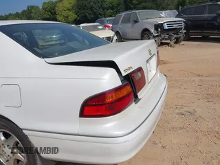1998 Toyota Avalon XL with VIN 4T1BF18B8WU263045, listed as a IAAI auction lot 40216979 with 150,592 mi miles and . Bid and sale history available at DreamBid. Image 16.