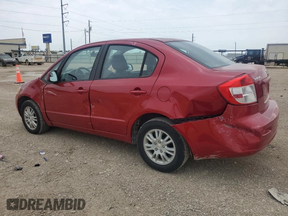 2012 Suzuki SX4 LE z VIN JS2YC5A33C6304897, wystawiony jako Copart lot #55567505 z przebiegiem 42 968 mil mil oraz Szkoda całkowita • Salvage title. Historia ofert i sprzedaży dostępna na DreamBid. Obrazek 2.