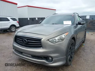 2014 Infiniti QX70 z VIN JN8CS1MU3EM451745, wystawiony jako IAAI lot #42203922 z przebiegiem 144 990 mil mil oraz . Historia ofert i sprzedaży dostępna na DreamBid. Obrazek 17.